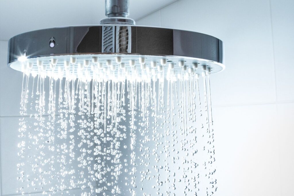 shower head with water on